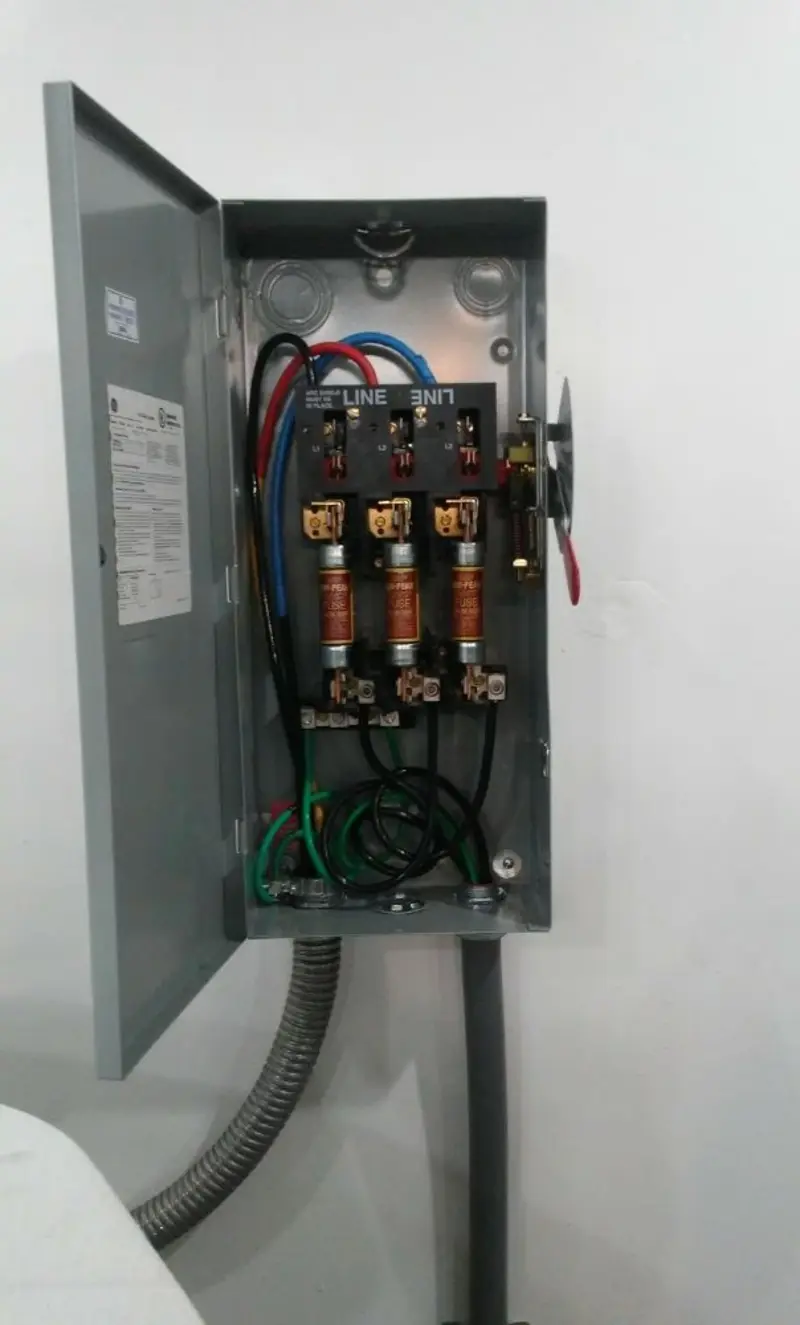Three-phase disconnect switch installed for Smoke Detector Installation in North Miami Beach